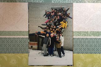 Nikolai Izyumov (in first row on the left) in Porechye children's camp with his students, late 1990s