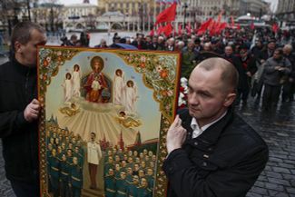 The icon depicting Stalin among his marshals with the Mother of God above.