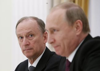 Security Council Secretary Nikolai Patrushev seated beside Vladimir Putin at the Kremlin in 2015 during the president’s meeting with the leaders of other BRICS nations