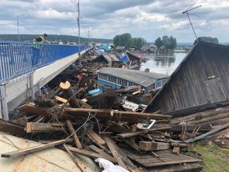 A bridge across the Iya River in Tulun. July 2, 2019