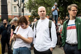 Meduza’s leaders observe the protest.