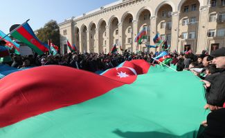 Locals in Ganja (Azerbaijan’s second-biggest city) celebrate the end of the war.