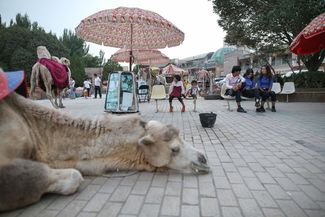 Attractions on the square outside the central mosque in Kashgar