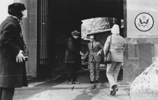 Andrei Sakharov outside of the U.S. Embassy in January 1977, he was secretly photographed by KGB agents after a meeting with embassy employee Igor Belousovich. Presumably, Sakharov and the diplomat discussed his appeal condemning the closed-door trial of the suspects in the Moscow subway explosions. Sakharov had been under the surveillance of the intelligence services since the early 1960s.