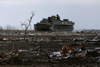 A tank emblazoned with Russia’s pro-invasion “Z” symbol on Volnovakha’s outskirts.