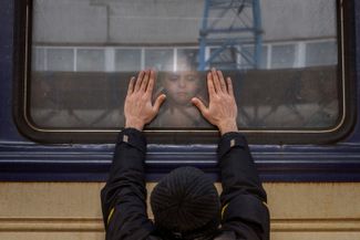 Alexander says goodbye to his five-year-old daughter, Anna, who’s about to leave for Lviv. Kyiv, March 4, 2022