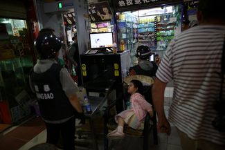 A checkpoint at the entrance to a supermarket in Kashgar