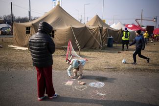 A Ukrainian family as a refugee camp in Vyšné Nemecké, Slovakia.