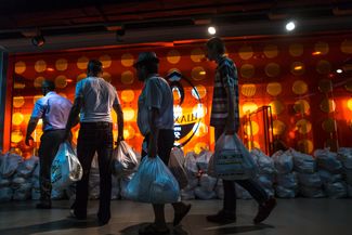 The people of Donetsk lining up for humanitarian supplies.