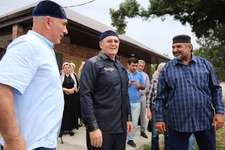 Human rights advocate Oyub Titiev (center) after leaving Penal Colony No. 3 in Argun, Chechnya. June 2019