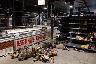 Inhabitants of cities caught in the fighting are facing shortages of food and medicine, as shown in this photo of a store in Irpin