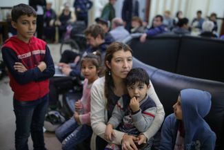 Residents of Stepanakert in a bomb shelter. October 4, 2020.