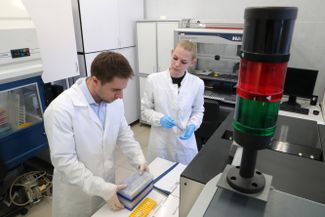 Employees work at a virology lab at the Central Scientific Research Institute for Epidemiology, which is controlled by Rospotrebnadzor. March 20, 2020